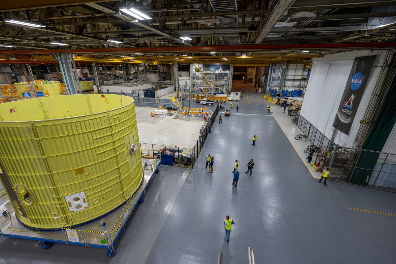 Technicians at NASA’s Michoud Assembly Facility move the intertank of NASA’s Space Launch System rocket for Artemis III to Cell G to await application of the thermal protection system. Thermal protection systems protect space vehicles from aerodynamic heating during entry to planet atmosphere and re-entry to earth atmosphere.  The intertank lays between the liquid hydrogen tank and liquid oxygen tank. Together with the engine section and the forward skirt, they comprise the SLS core stage. The liquid hydrogen tank and liquid oxygen tank hold 733,000 gallons of propellant to power the stage’s four RS-25 engines needed for liftoff and Artemis missions to the Moon and future missions to Mars.